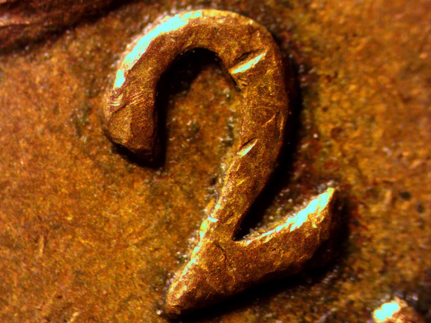 Фрагмент медной монетки. Использована окулярная камера ToupCam SCMOS00920KPА  и ахроматический объектив 4х/0.10.